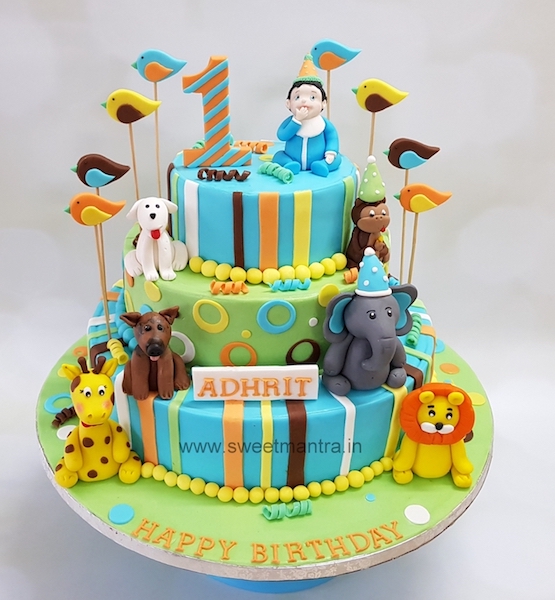 Animals theme customized 3 tier fondant cake for boy's 1st birthday in Pune