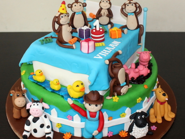 5 little monkeys and Old McDonald theme customized cake for 1st birthday in Pune