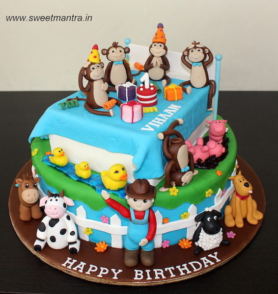 5 little monkeys and Old McDonald theme customized cake for 1st birthday in Pune