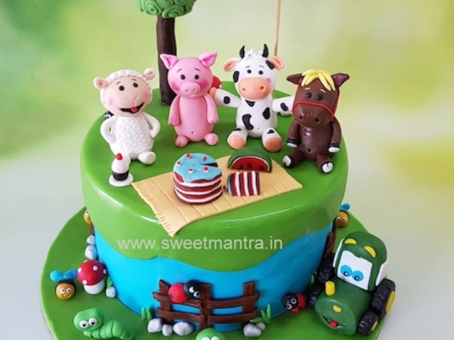 Farm animals theme customized fondant cake for girl's 4th birthday in Pune