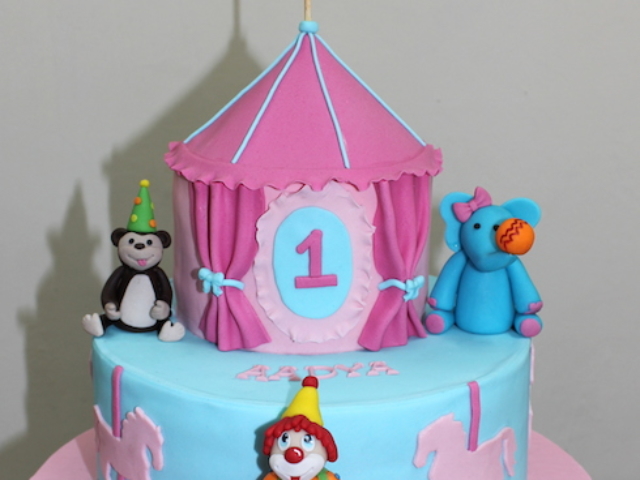 Carnival,Circus Animals,Joker theme fondant cake for 1st birthday in Pune