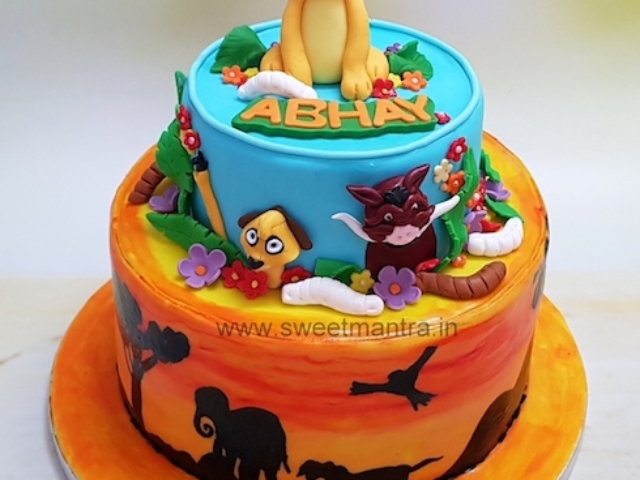 Lion King animals theme customized 2 tier fondant cake for boy's birthday in Pune