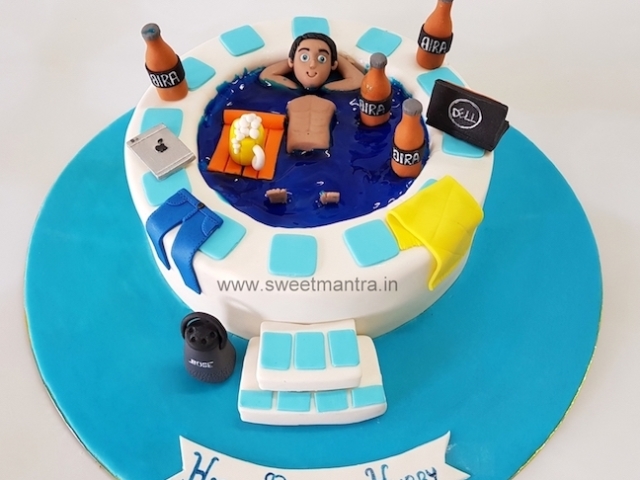 Guy relaxing in Jacuzzi, Pool shaped 3D cake for husband's birthday in Pune