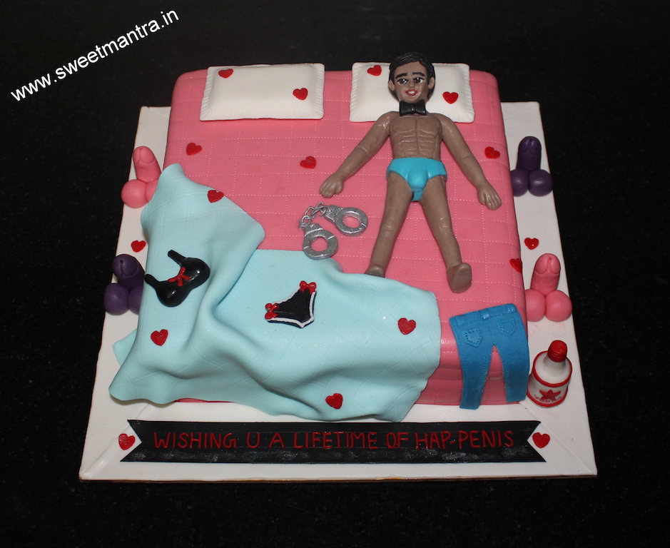 Bed cake with male stripper for bachelorette in Pune
