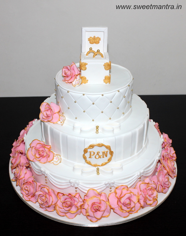 Flowers theme 3 tier customized cake for Ring Ceremony in Pune