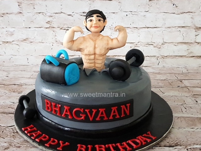 Gym theme cake with 3D body builder figure in Pune