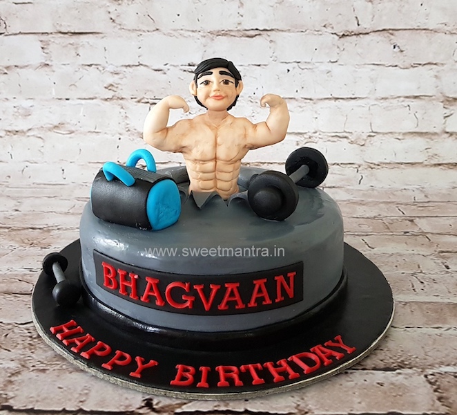 Gym theme cake with 3D body builder figure in Pune