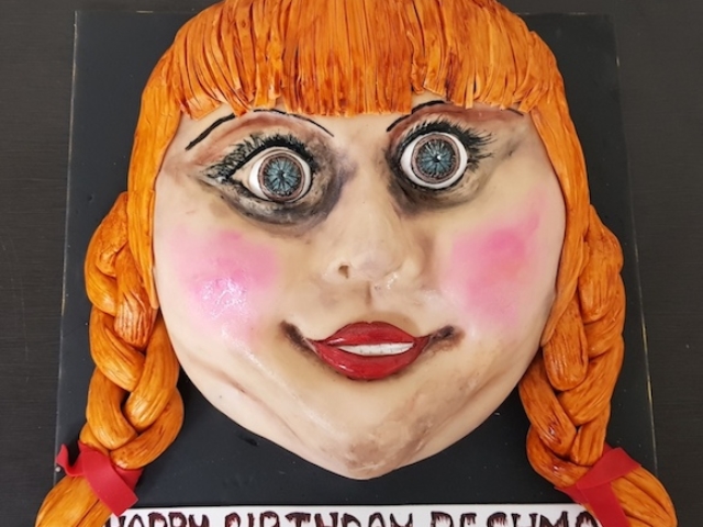 Horror movie Annabelle face shaped handpainted 3D cake in Pune