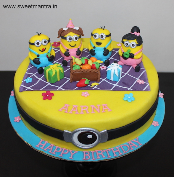 Minions in a party theme customized birthday cake for girl in Pune