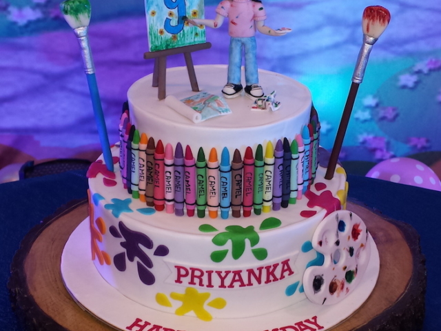 Painting theme 2 layer customized cake with 3D girl figure in Pune