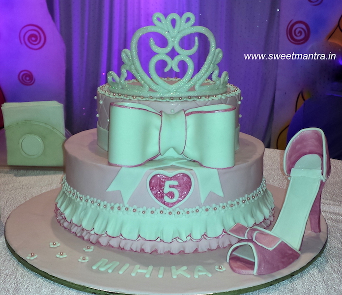 Princess theme 2 layer fondant cake with edible tiara and shoe in Pune