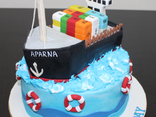 Cargo ship theme customized cake with 3D ship in Pune