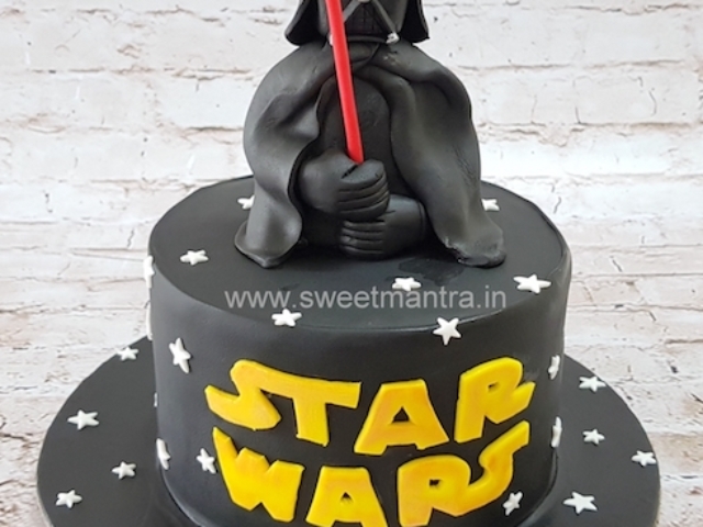 Star wars theme designer cake with 3D Darth Vader figure in Pune