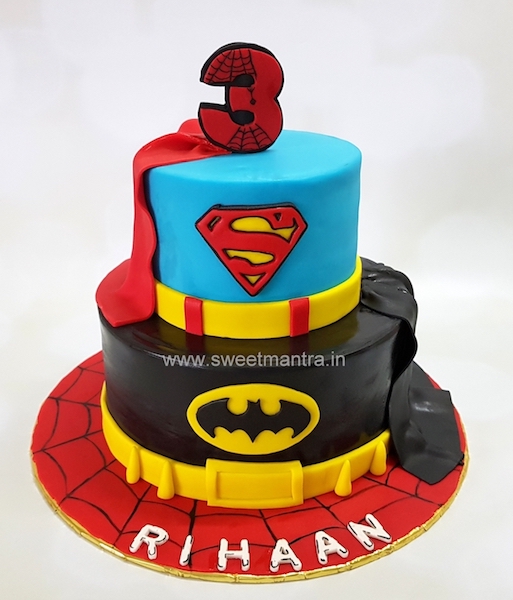 Superhero logos theme 2 tier fondant cake for kids birthday in Pune