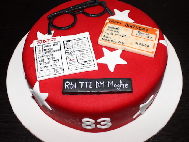 TTE train ticket checker theme cake for 83rd birthday in Pune