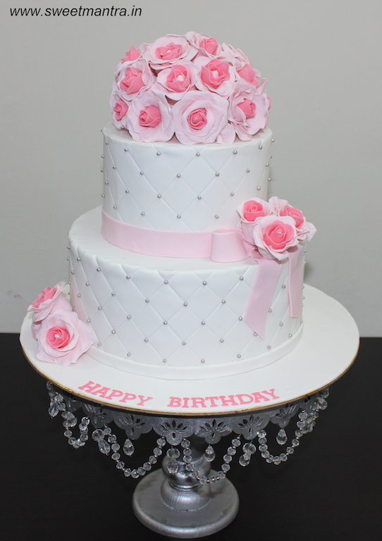 Roses theme 2 tier fondant cake for Wedding Reception and Bride's birthday in Pune
