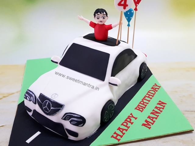 Mercedes car shaped customized 3D cake with boy on sunroof for kids birthday in Pune