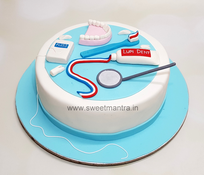 Customized fondant cake for dentist's birthday in Pune