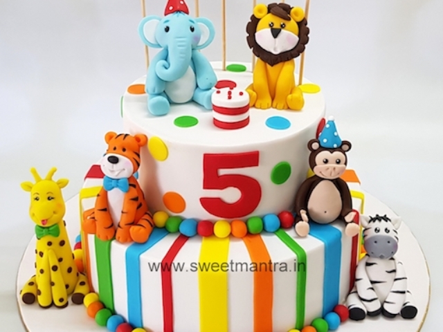 Animals theme 2 tier colorful fondant cake for kids 5th birthday in Pune