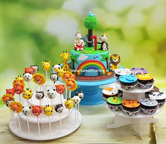 Animals, Jungle theme dessert table with customised cake, cupcakes n cake pops for 1st birthday in Pune