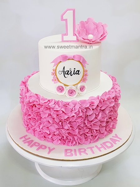 Ruffles theme 2 tier fondant cake for girls 1st birthday in Pune