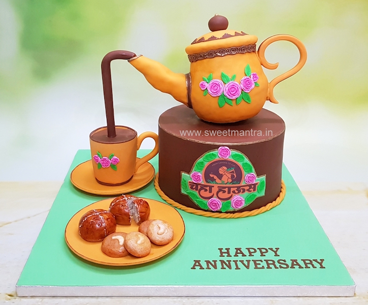 Teapot theme gravity defying cake for anniversary of Chaha House company in Pune