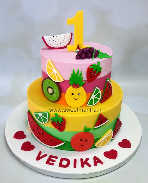 Fruits theme 2 tier cake for 1st birthday in Pune