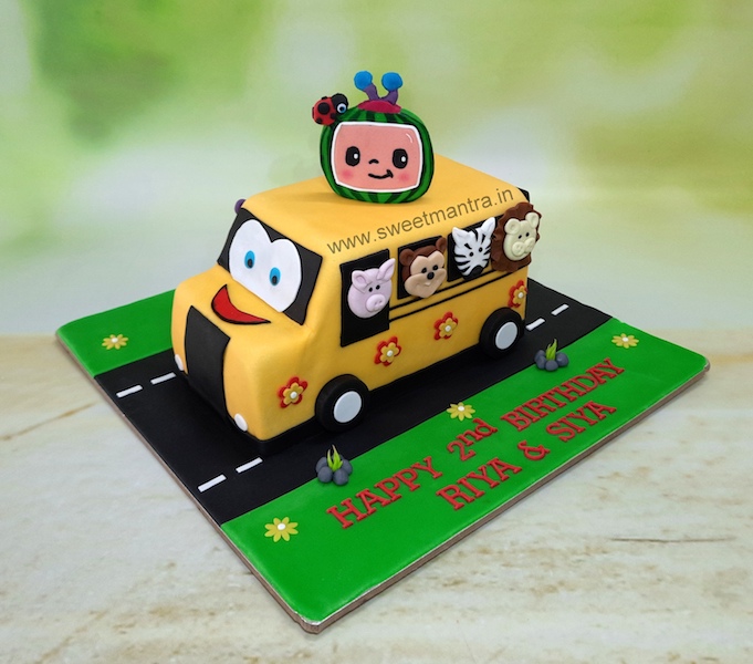 Wheels on the bus shape cake for twins birthday in Pune