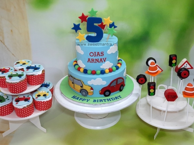 Vehicles theme dessert table for twin boys 5th birthday