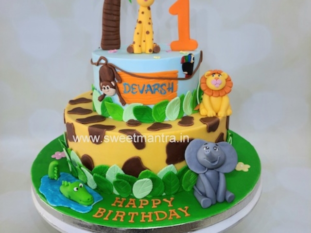 Jungle theme 2 tier fondant cake for 1st birthday