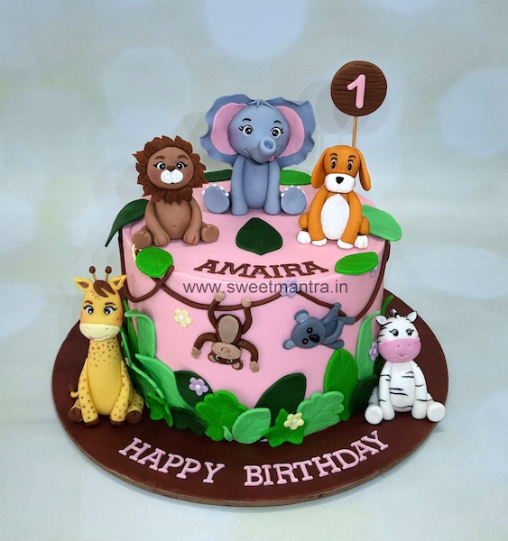 Jungle theme cake for girl's 1st birthday