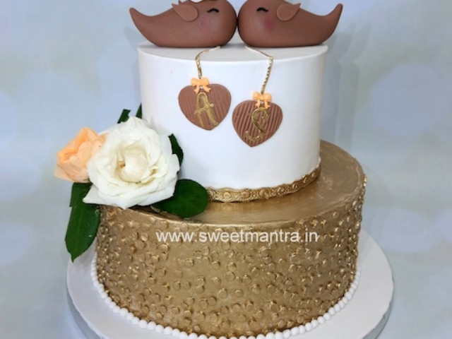 Engagement theme 2 tier fondant cake