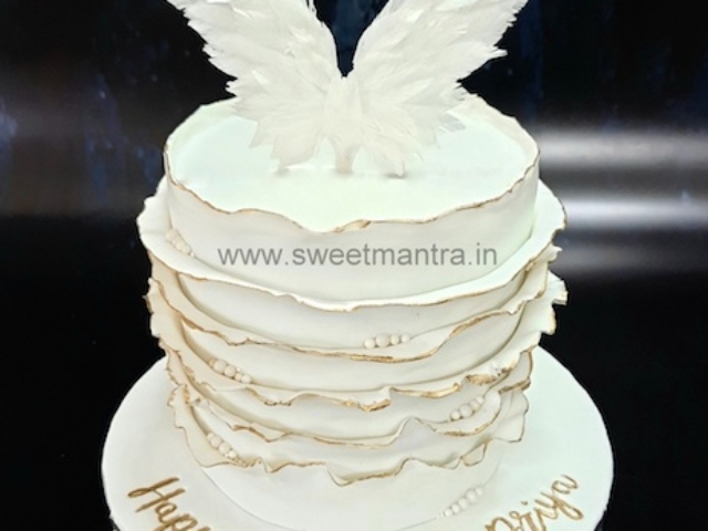 Ruffles and Angel wings special cake for girls birthday