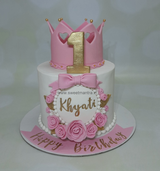 Princess theme cake for girl's 1st birthday