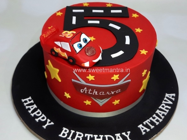 Mcqueen car cake with race track