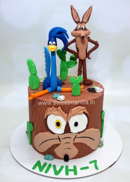 Coyote and roadrunner cake