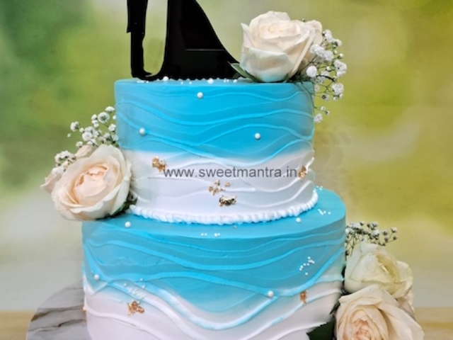 Engagement 2 tier cream cake