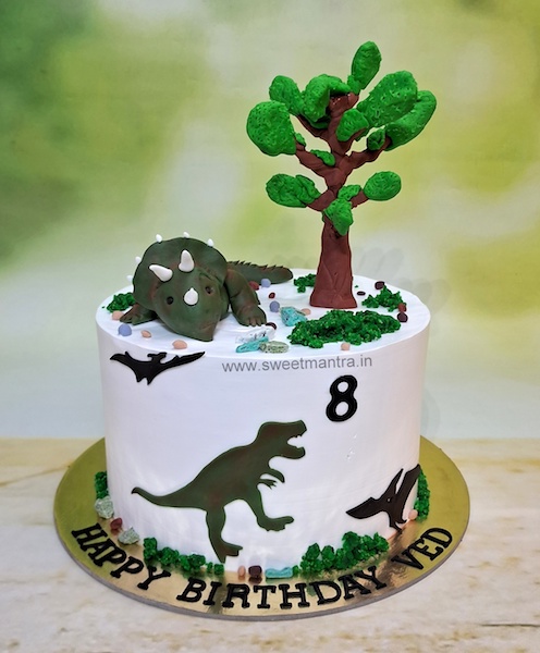 Dinosaur theme cream cake