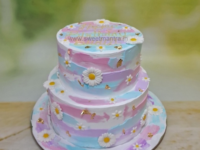 Flowers tier cake in cream